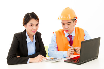 Young Asian male engineer talking to female business woman on white background.