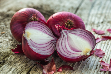 red onions on rustic wood