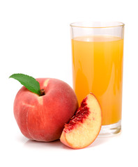 Glass of fruit juice and cut peaches isolated on white background