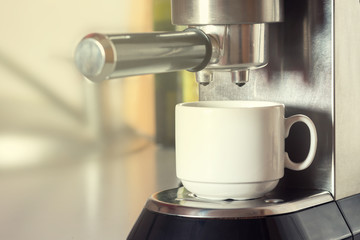 coffee machine with white cup