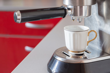 coffee machine with white cup
