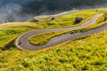 Fototapeta premium Motorcycle drivers riding in Alpine highway. Outdoor photography