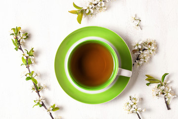 Tea and flowers of cherry