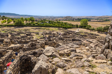Barumini, Sardinia, Italy. Ruins of the nuragic archeological complex of Su Nuraxi di Barumini, a view from the central tower. UNESCO World Heritage List.
