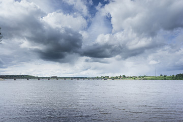 View of thunderstorm clouds above water