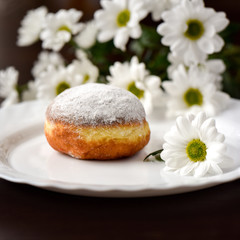 Obraz na płótnie Canvas Homemade donut with flowers