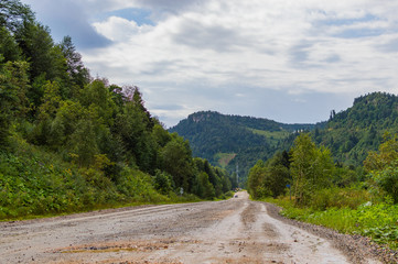 Dirt road in the mountains of Adygea republic, Krasnodar region, Russia
