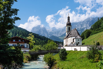 Scenic view of small church against mountains