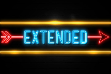 Obraz premium Extended - fluorescent Neon Sign on brickwall Front view