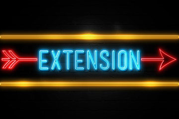 Extension  - fluorescent Neon Sign on brickwall Front view