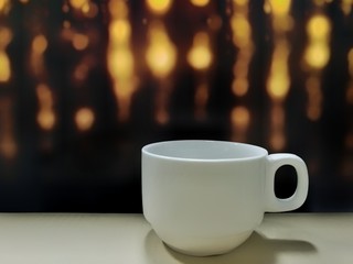 Obraz na płótnie Canvas coffee cup with bokeh soft defocused background. energy motivation concept