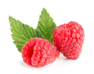 Two raspberries with leaf isolated on white background macro