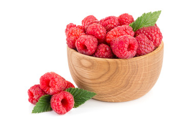 Raspberry in a wooden bowl isolated on a white background