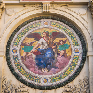 Tile medallion allegory in Arles - France. The fountain was built by Pierre-Amedee Pichot between 1884 - 1887