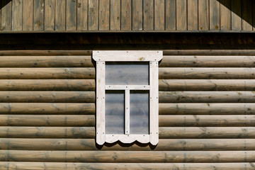 Village house logs and window