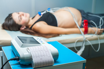 Electrocardiogram, cardiac cardiograph and conduct research, .ECG and examination of the heart during pregnancy