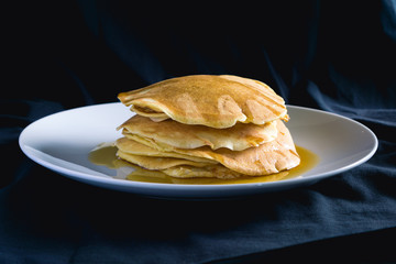 Pancakes Pile with Maple Syrup