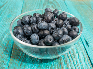 Bowl with fresh blueberries