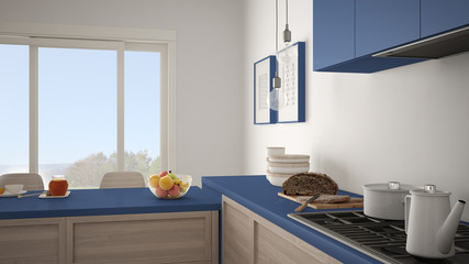 Modern kitchen with wooden details and parquet floor, healthy breakfast, minimalist blue navy interior design