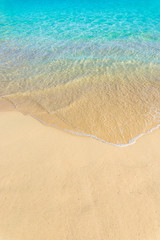 Fototapeta na wymiar Summer holiday, beautiful beach sand with tropical clear sea water background