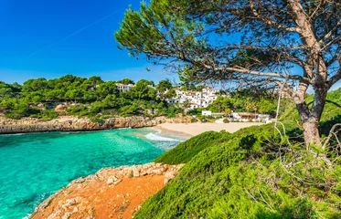 Fototapete Rund Mediterranes Europa Beautiful view of mediterranean bay beach with turquoise sea water at Cala Anguila, Majorca Spain  © vulcanus