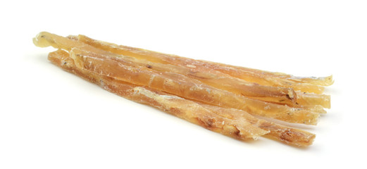 Dried salted fish sticks isolated