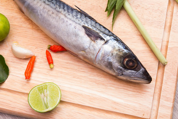 Prepare fish on  cutting board