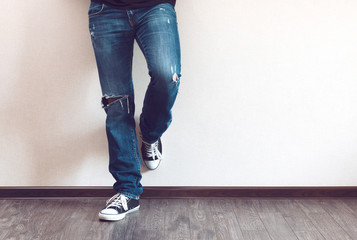Man's legs in jeans - Powered by Adobe