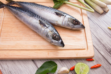 Prepare fish on  cutting board