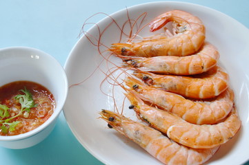 baked salt prawn on plate eat couple with spicy and sour sauce