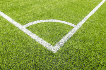 Obraz premium The Corner of the artificial grass soccer field.