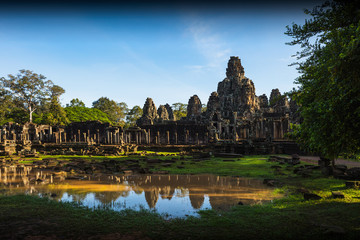 Obraz premium Ancient stone faces of Bayon temple, Angkor wat Siam Reap Cambodia