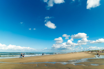 Blue skies above the beach of Zandvoort aan Zee, The Netherlands - obrazy, fototapety, plakaty