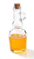food oil in bottle on white