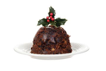 Fototapeta na wymiar isolated christmas brandy pudding on plate with holly