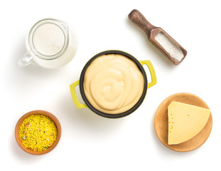 cheese sauce in bowl isolated on white