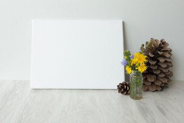 Mockup poster in the interior. Blank canvas frame for your image.