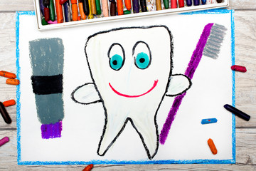 Photo of colorful drawing: smiling healthy tooth holding a toothpaste and a toothbrush