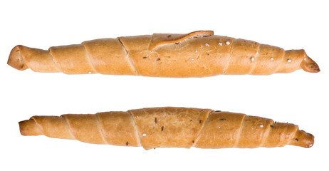 Tasty freshly baked crunchy snack. Two long salty rolls of gold color isolated on white background.