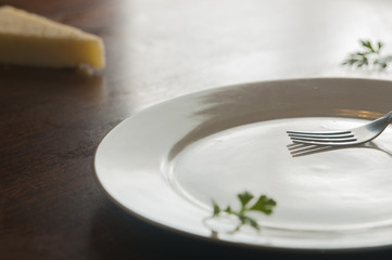 Plate with cheese and parlsey