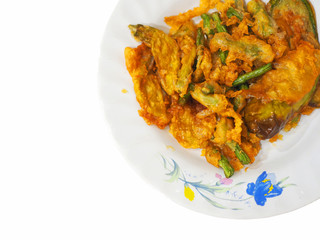 Top view string bean, eggplant deep fried tempura on white ceramic plate, white background isolated