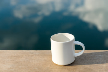 White coffee mug in the morning time