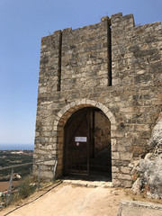 Fototapeta na wymiar The main entrance of the ancient Kastro, a Venetian castle, in Cephalonia or Kefalonia in Greece