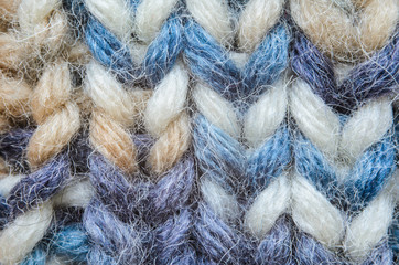 Melange blue knitting texture close-up. Macro snapshot texture of knitted fabric