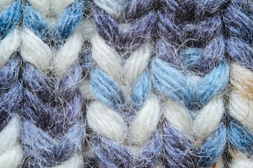 Melange blue knitting texture close-up. Macro snapshot texture of knitted fabric