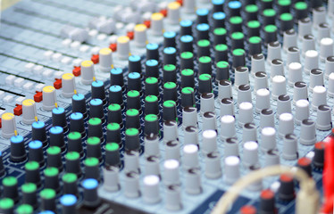 The remote sound engineer. Remote control of the sound engineer shallow depth of field. 