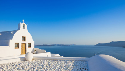 Small traditional Greek Orthodox church in Oia, Santorini © Lukas Gojda