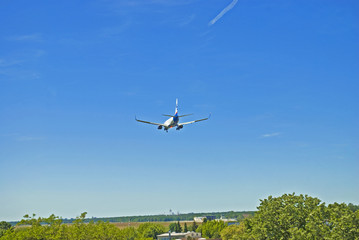 Airplane landing on Tegel airport in Berlin, Germany
