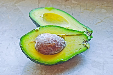 Half of an avocado with the pip