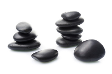 Fototapeta na wymiar Massage stones on white. Black Stones isolated